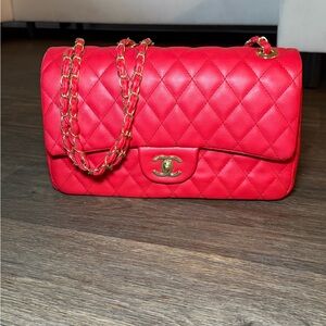 Red flap bag with gold hardware
